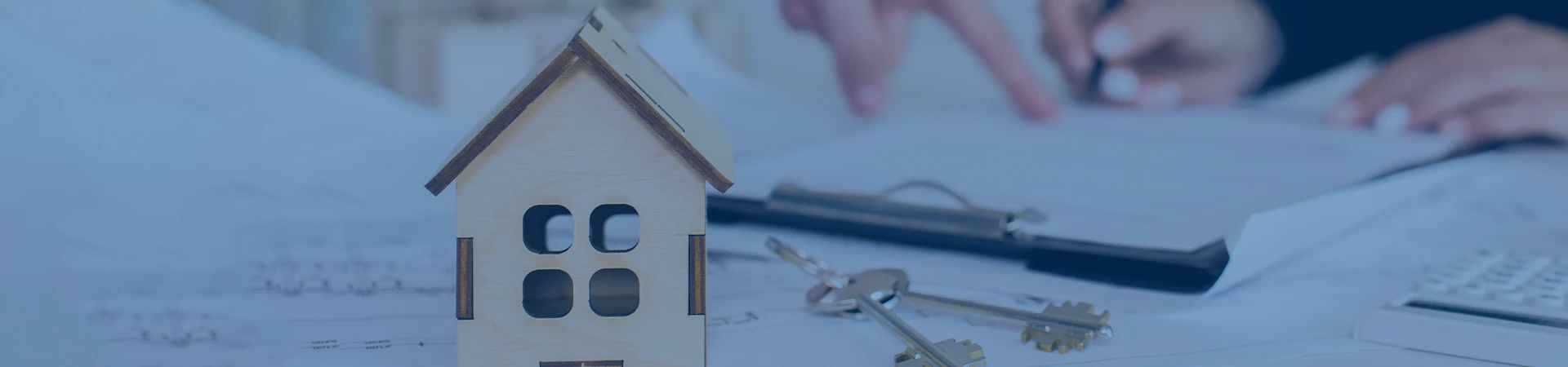 A house model & key with papers